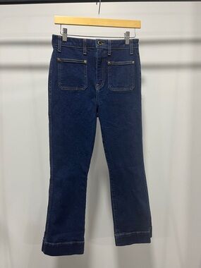 KHAITE Dark Navy High-Rise lightly flared, croppedJeans with Front Patch Pockets
